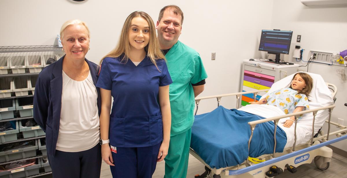 University of South Alabama nursing student Alli Boudreaux joined her father, Mike Boudreaux, and grandmother, Anita Sirmon, both South nursing alumni, on a recent tour of the Health Simulation Building. 